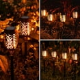 thumbnail image 3 of Outdoor Halloween Decorations, 10Pack Purple Flickering Flame Solar Torch Light for Yard Decorations, Waterproof Halloween Lights Outdoor, Solar Lights for Outside Decor Garden Patio Lawn Path Scary, 3 of 10