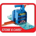 thumbnail image 4 of Hot Wheels Toy Car Track Set, Display Launcher & 2 1:64 Scale Vehicles, Visible Storage for 6 Cars Toy Cars, Connects to Track, 4 of 6