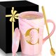 thumbnail image 1 of Taza de café de cerámica MNZZ de mármol rosa con tapa y cuchara, 1 of 7