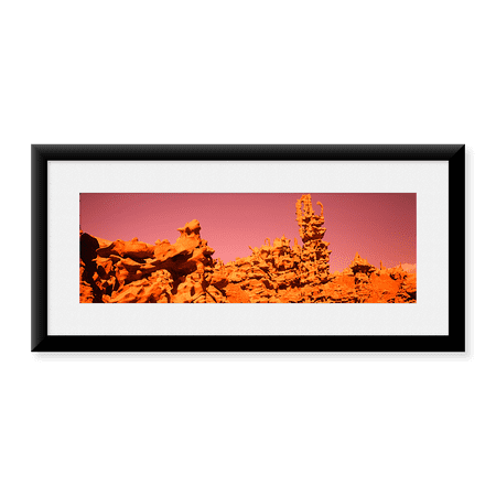 Framed Art Print, Low angle view of rock formations by Panoramic Images, 25-7/8" x 9-7/8"