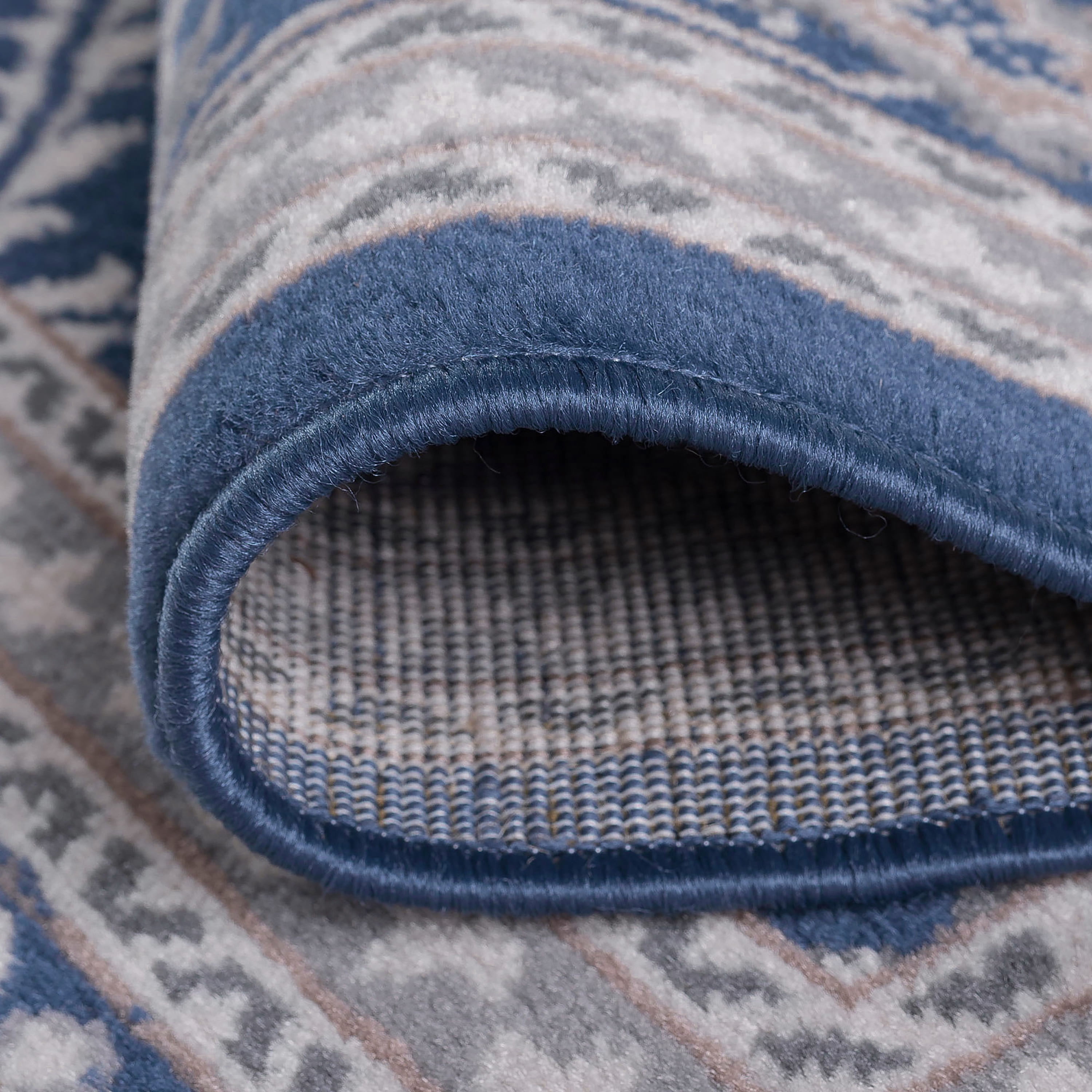 Madison Traditional 2' x 7' Navy and Cream Polypropylene Indoor Area Rug