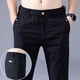 thumbnail image 4 of Pantalones casuales ajustados de color blanco roto para hombre, pantalones formales de negocios ajustados para hombre, pantalones holgados de poliéster con bolsillos arrugados de verano, 4 of 5