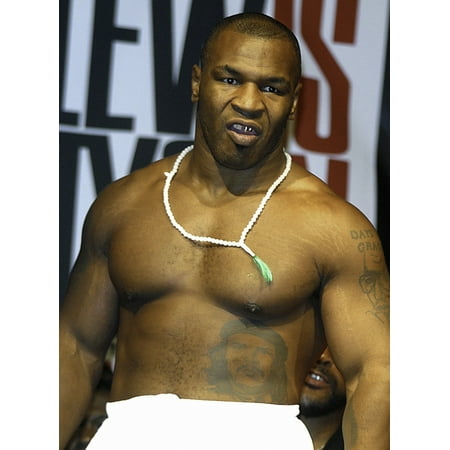 Mike Tyson weighing in before his fight with Lennox Lewis Photo (Lennox Lewis Best Fight)