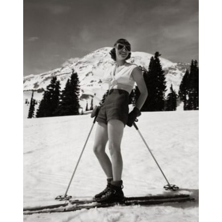 Young woman standing with skiing equipment and smiling Canvas Art - (18 x 24)
