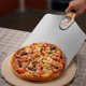 thumbnail image 5 of Raspador plegable de la manija de madera de la espátula del metal de aluminio de la cáscara de la paleta de la pizza para hornear el pastel de pan Advancent HA002255-00B, 5 of 7