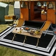 thumbnail image 4 of HIWEAVER 10' x 14' Black/White Outdoor Rug PP Plastic Straw Woven Waterproof Patio Rug with Border Portable Outside Carpet for Balcony Deck Picnic Garden Decor, 4 of 5