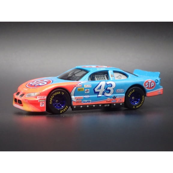 Open Box 1999 99 PONTIAC GRAND PRIX JOHN ANDRETTI STP NASCAR 1:64 DIECAST MODEL CAR