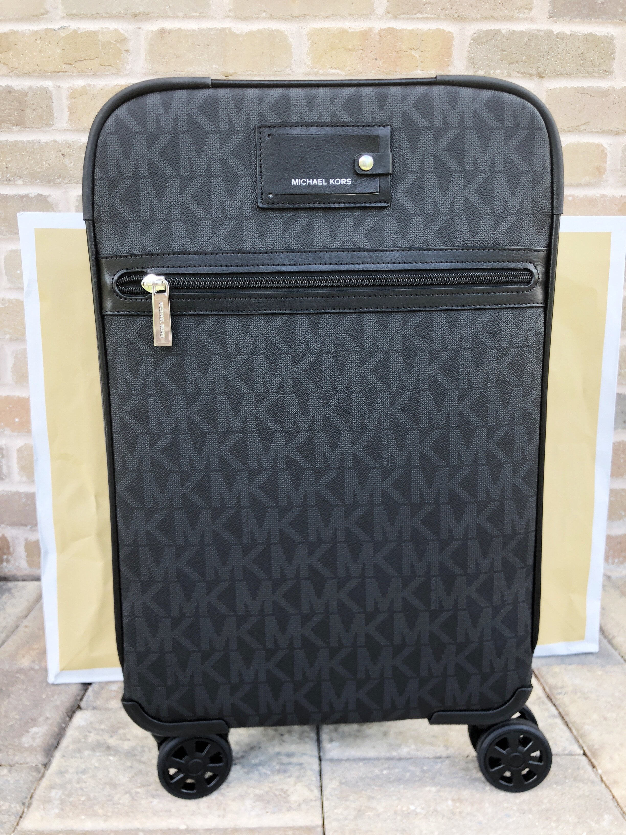 michael kors carry on luggage with wheels