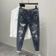 thumbnail image 2 of Pantalones vaqueros rasgados con estampado para hombre, pantalones con agujeros gráficos rotos, pantalones casuales suaves Kpop con estilo, pantalones vaqueros holgados góticos regulares para hombre, 2 of 4