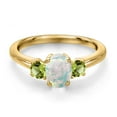 thumbnail image 3 of Gem Stone King 18K Yellow Gold Plated Silver Simulated White Opal and Green Peridot Engagement Ring for Women | 1.41 Cttw | Oval Cabochon 7X5MM | Gemstone October Birthstone | Size 7, 3 of 6