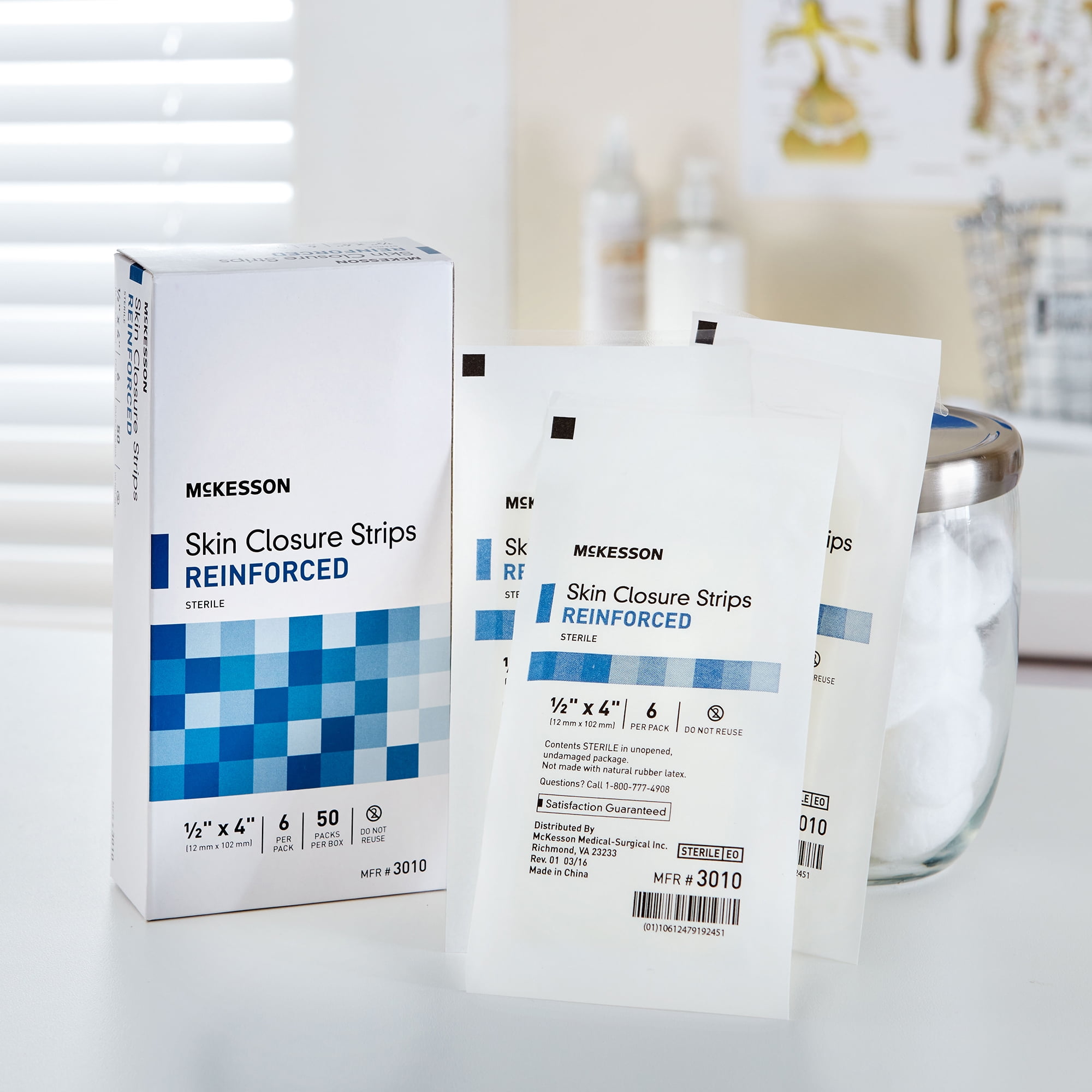 McKesson Skin Closure Strips - Sterile, Reinforced Wound Bandage, 1/2 in x 4 in, 50 Ct