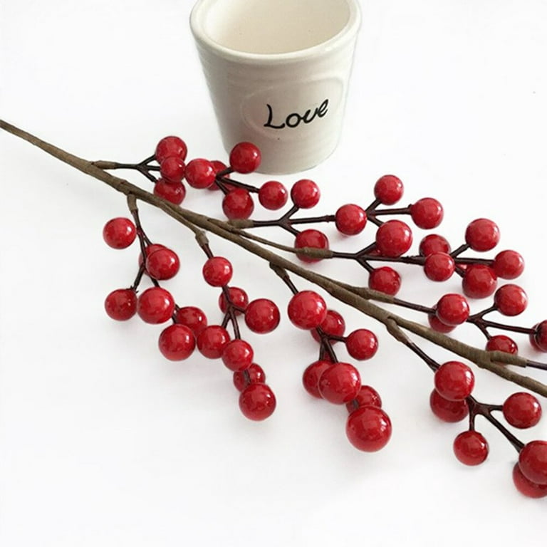 Premium Photo  Branch with red berries, christmas decor.