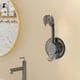 thumbnail image 1 of Soporte de cabezal de ducha ajustable sin orificio | Montura de bayoneta universal | Base de pared adhesiva impermeable giratoria de 360° | Ganchos incorporados para toallas y accesorios | Plástico, 1 of 6