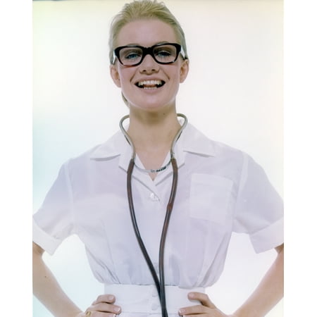 Judy Geeson wearing a White Shirt Dress with Stethoscope and Eyeglasses Photo