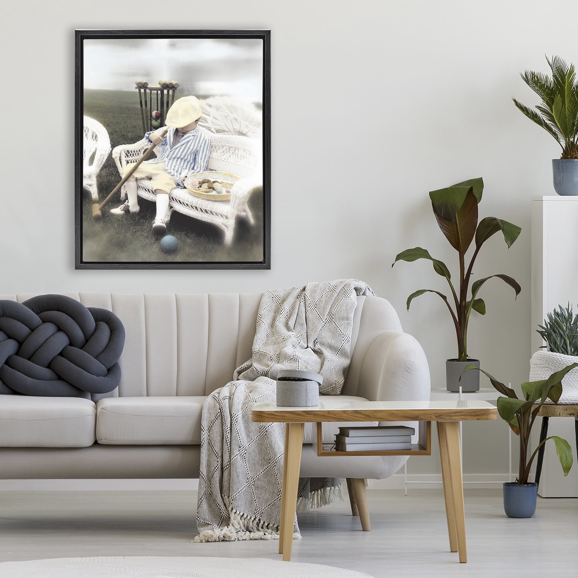 Stupell Industries Child with Croquet Mallet Black Framed Floater Canvas Wall Art, design by Kendra Dew