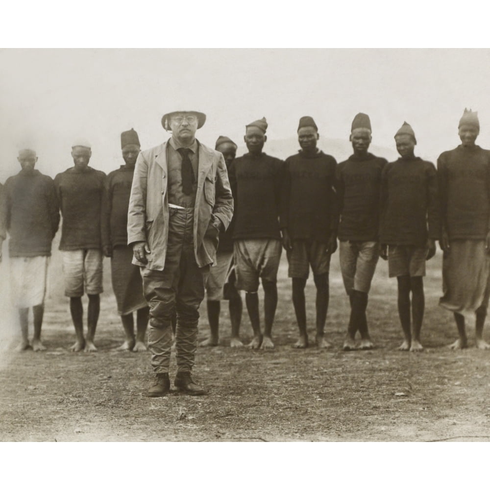Theodore Roosevelt Standing In Front Of African Men Working For His Safari. They Served As