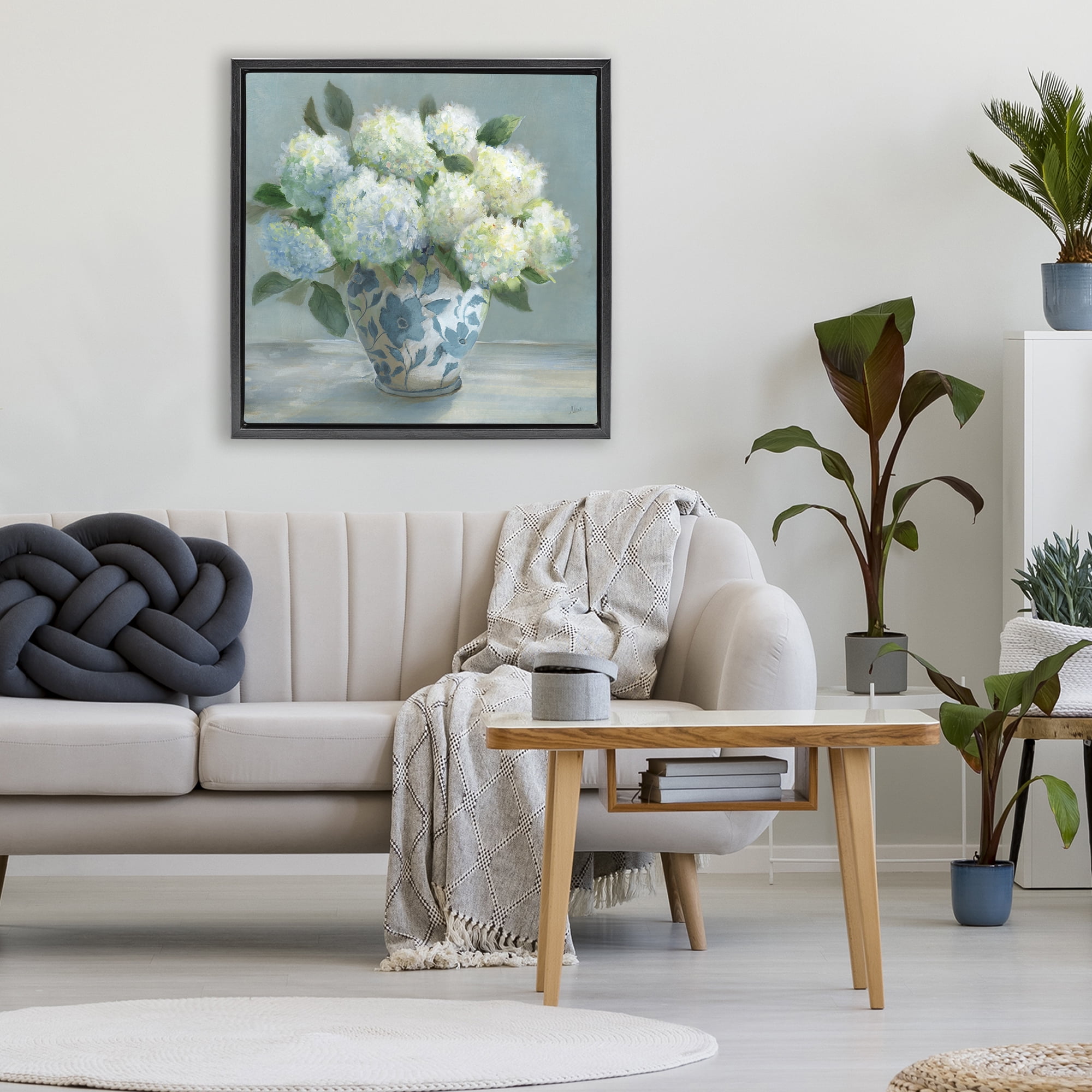 Stupell Industries Hydrangeas in Elegant Vase Black Framed Floater Canvas Wall Art, design by Nan