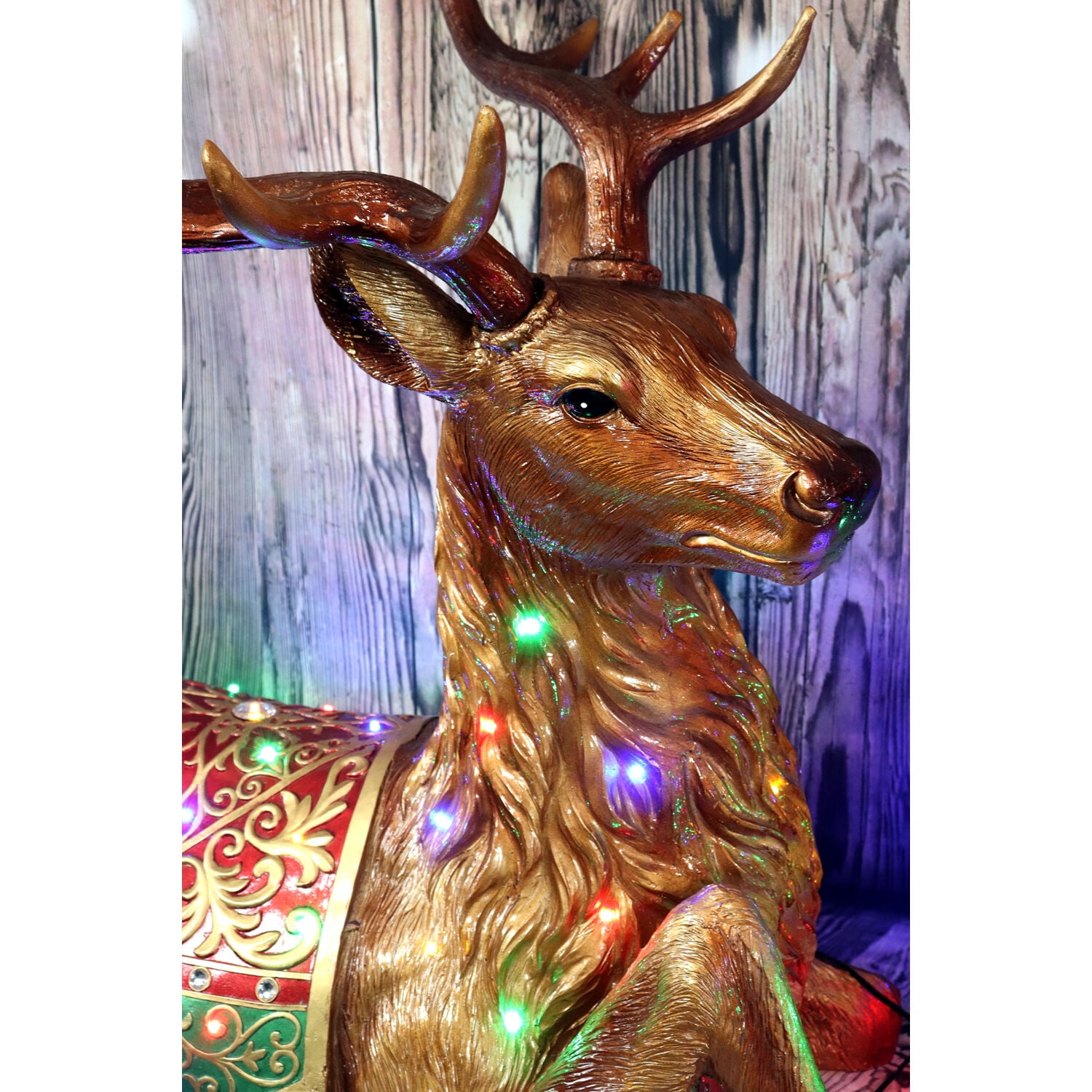 Fraser Hill Farm Indoor/Outdoor Oversized Christmas Decor with Long-Lasting LED Lights, 4-Ft. Tall Sitting Reindeer with Metallic Finish, FFRS047-RD1-BRN