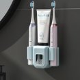 thumbnail image 1 of Soporte para cepillo de dientes eléctrico, exprimidor automático de pasta de dientes para colgar en la pared, sin perforaciones, para inodoro, 1 of 2