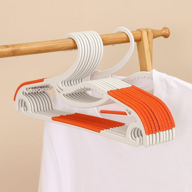 Perchas de ropa antideslizantes Paquete de 10 | Diseño de plástico delgado que ahorra espacio, hombros anti-marcas, ganchos a prueba de viento, multifunción | Gris y naranja | Adecuado para húmedo y