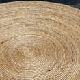 thumbnail image 6 of Uttermost Rora Round Coastal Wood and Banana Plant Woven Coffee Table in Brown, 6 of 7