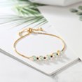 thumbnail image 3 of Gem Stone King 2.70 Ct Round Cabochon White Simulated Opal Blue Created Sapphire 18K Yellow Gold Plated Silver Tennis Bracelet for Women, 3 of 3