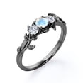 thumbnail image 3 of JeenMata Trio Stone - 1 Carat Round Shaped Rainbow Moonstone and Moissanite - Botanical Design Engagement Ring - 18K Black Gold Plating over Silver, 3 of 6