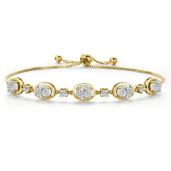 Gem Stone King 18K Yellow Gold Plated Silver White Lab Grown Diamond Bracelet for Women | 3.50 Cttw | Gemstone April Birthstone | Oval 7X5MM | Fully Adjustable 9 inch