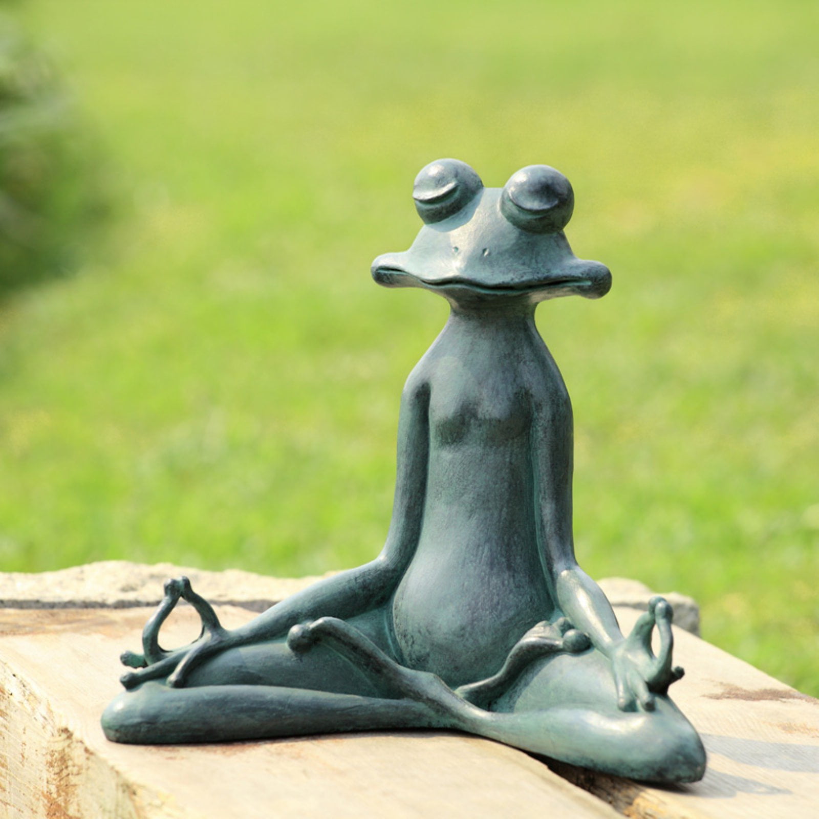 relaxing frog statue