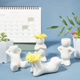 thumbnail image 4 of Mini soporte de cerámica para plantas de aire, 4 macetas de porcelana con forma de muñeca, diferentes formas, para Tillandsia, para plantar en casa o para decorar la oficina., 4 of 8