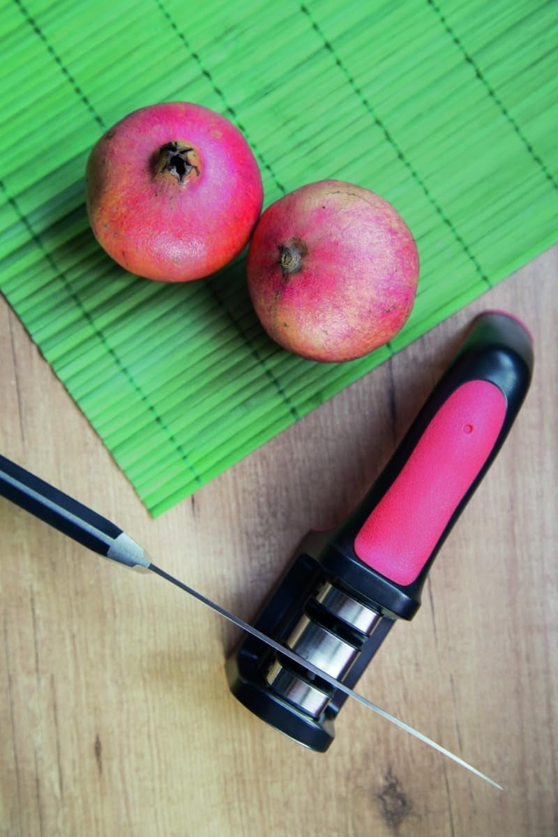 Sharpeners Manual Knife Sharpener tool. Made of + TPE. Carbide and Ceramic s. Keep Your Knives Razor Sharp. Black and Red Color