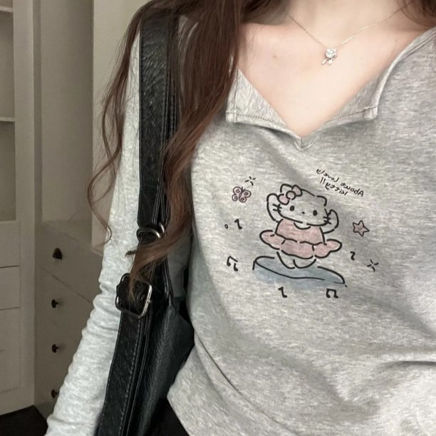 Sanrio Hello Kitty camiseta de manga larga con estampado de dibujos animados para mujer Y2K Sweet Girl Graffiti Slim Fit moda versátil Top otoño