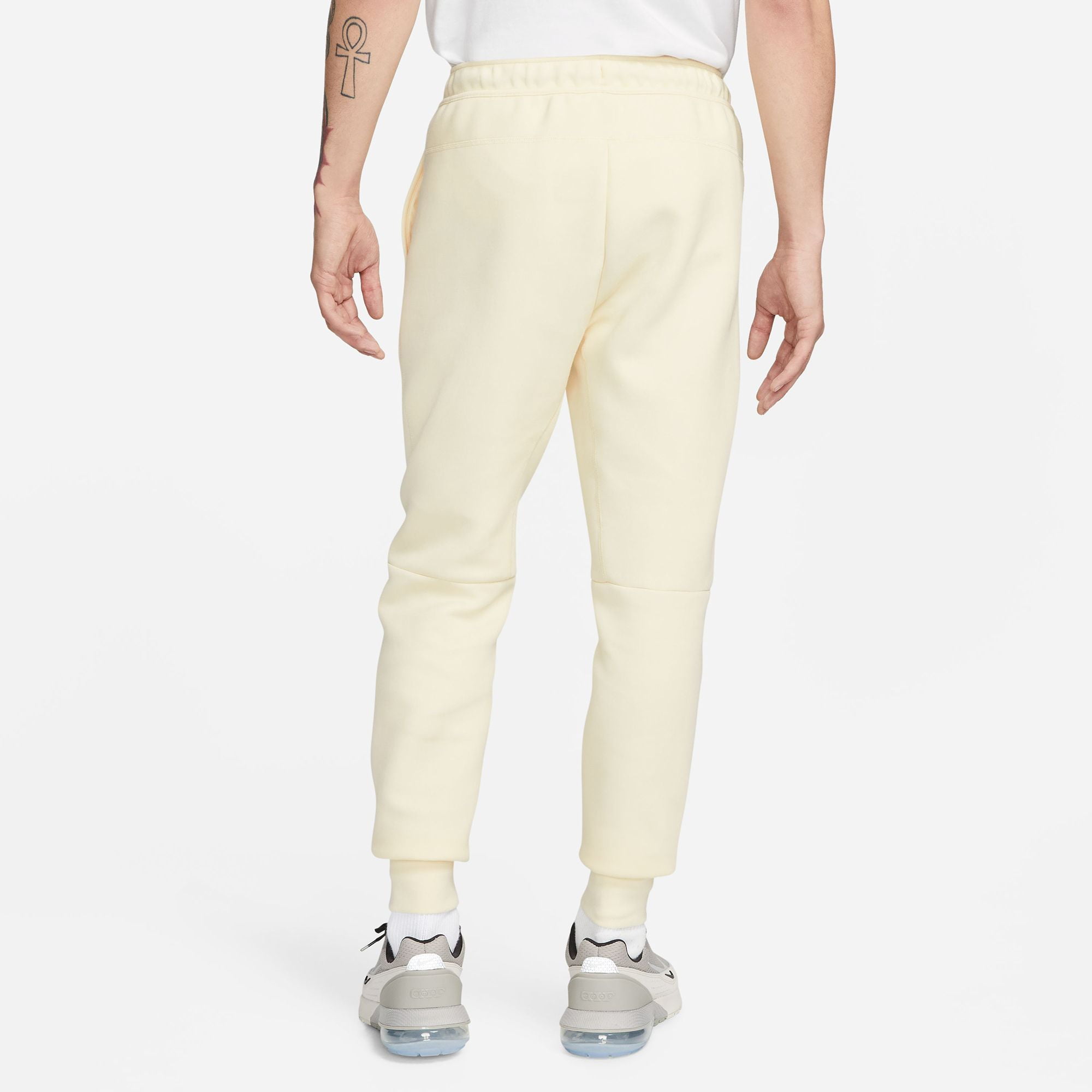 cream nike joggers mens