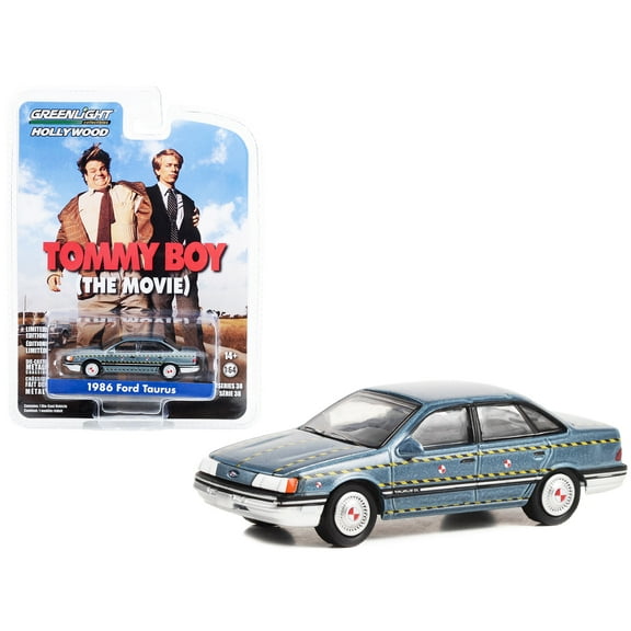 1986 Ford Taurus Blue Met. "Zalinsky Auto Parts" Crash Test Vehicle "Tommy Boy" 1995 Movie 1/64 Diecast Model Car by Greenlight