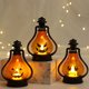 thumbnail image 5 of Linterna de calabaza de Halloween con LED parpadeante, lámpara colgante para exteriores con llama, linterna de decoración navideña, 5 of 5