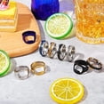 thumbnail image 4 of Elegante anillo abridor de botellas de acero inoxidable, diseñado ergonómicamente para uso a largo plazo en fiestas de cumpleaños, celebraciones de bodas, banquetes, que ofrece comodidad portátil y, 4 of 5