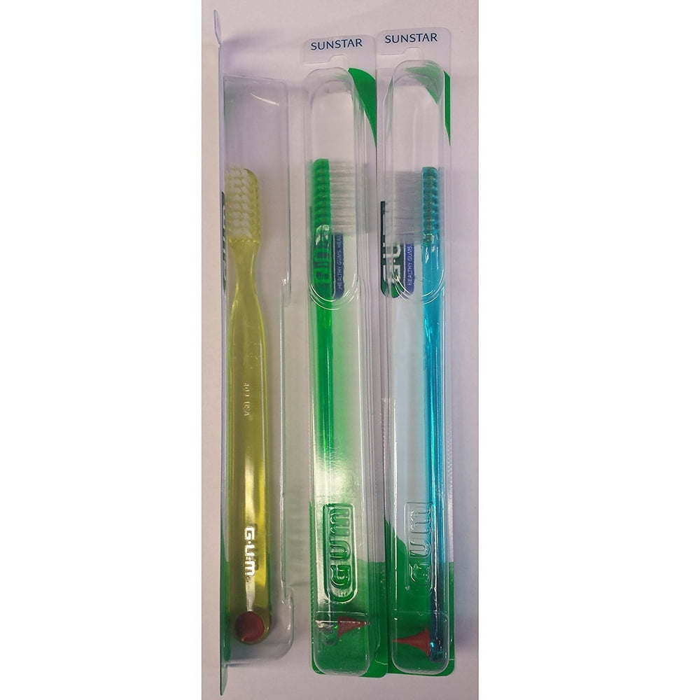 409 Toothbrush With Stimulator Compact Soft by, Fitted with a