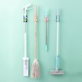 thumbnail image 3 of Muyoka Soporte de fregona multifuncional Soporte de escoba autoadhesivo Gancho de clip de fregona de dibujos animados Capacidad de carga 10KG Perforación libre Colgador de almacenamiento de escoba par Muyoka Hogar, 3 of 7