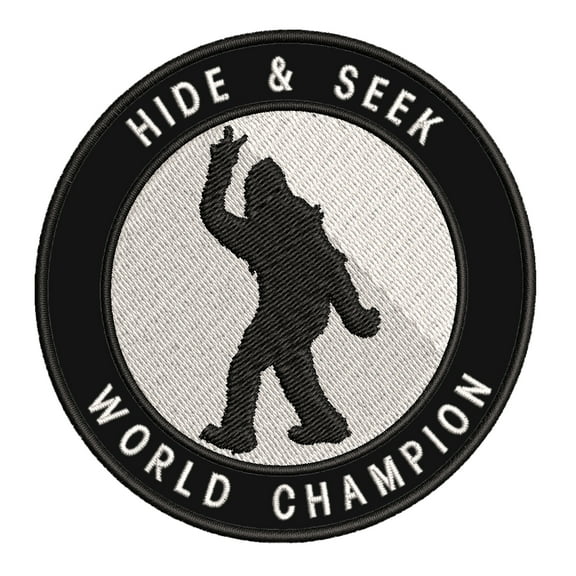 Bigfoot Hide & Seek World Champion 3.5" Iron On Or Sew On Embroidered Fabric Badge Patch Unexplained Mysteries Iconic Series