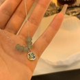 thumbnail image 3 of Collar con Hebilla Ping Shaofei de Acero de Titanio, 3 of 3