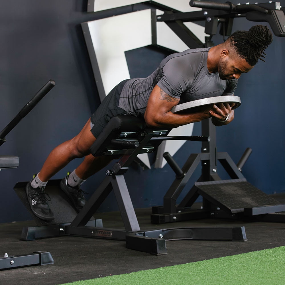Titan Fitness Roman Chair Back Extension Machine, Adjustable Hyperextension Bench, Soft Durable Padding, Non-Slip Footplate, Adjustable Height, Exercise Equipment for Core, Back, Hamstrings, Glutes
