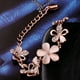 thumbnail image 3 of Pulsera de flores de oro rosa con pétalos huecos ecológicos, decorada con cuentas de cristal para mujer., 3 of 7
