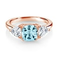 thumbnail image 2 of Gem Stone King 18K Rose Gold Plated Silver Sky Blue Topaz and White Moissanite 3 Stone Engagement Ring for Women (2.94 Cttw, Gemstone November Birthstone, Available in Size 5, 6, 7, 8, 9), 2 of 3