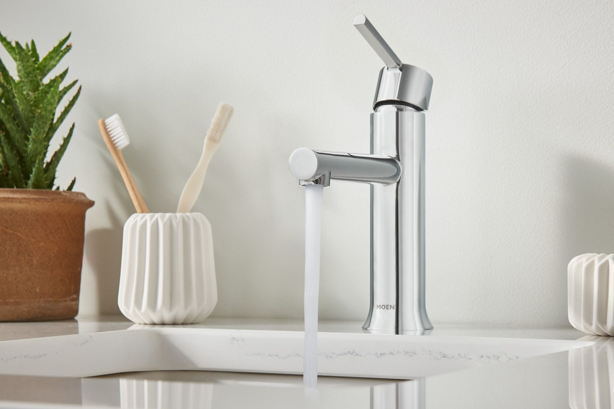 Moen Arlys Single Handle Modern Chrome Bathroom Faucet with Deck Plate