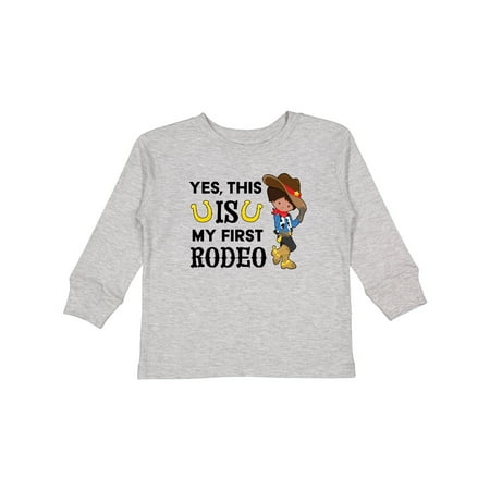 

Inktastic Yes This is My First Rodeo- Cowboy in Hat and Boots Gift Toddler Boy Girl Long Sleeve T-Shirt