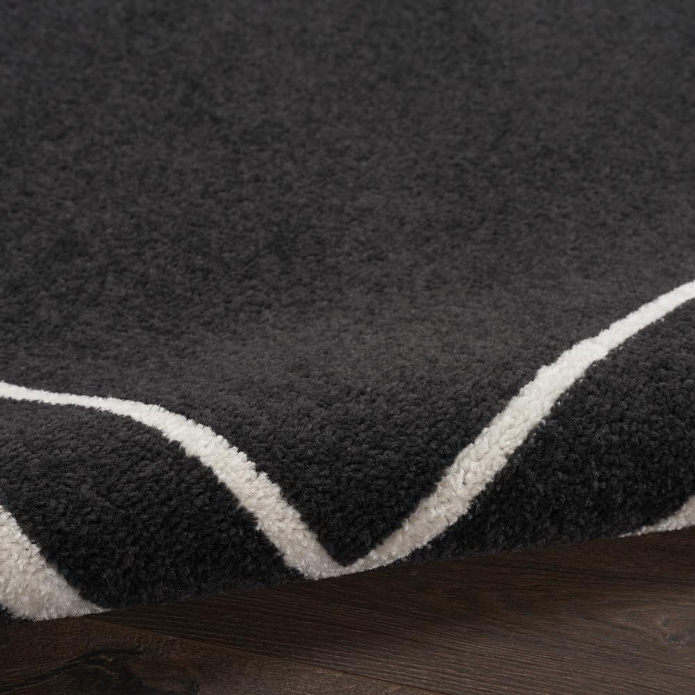 Nourison Essentials Indoor/Outdoor Black Ivory 5' x 7' Area Rug, (5x7)