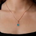 thumbnail image 3 of Gem Stone King 18K Rose Gold Plated Silver London Blue Topaz and Red Garnet Pendant Earrings Set for Women (4.58 Cttw, Gemstone November Birthstone, with 18 inch Chain), 3 of 4