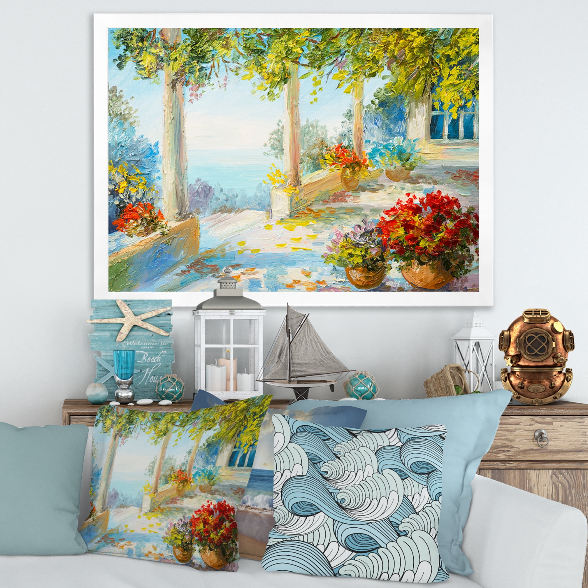 Designart 'Terrace With Red Flowers Near The Sea' Nautical & Coastal Framed Art Print
