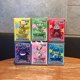 thumbnail image 2 of Serie Pokémon sentada en filas, adornos para vasos, figuras de juguete de moda de Pikachu, juguetes de escritorio para autos, cajas de regalos brillantes, 2 of 5