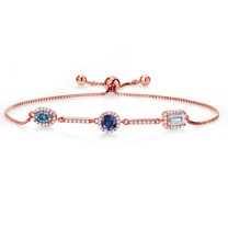 Gem Stone King 18K Rose Gold Plated Sterling Silver Bracelet Oval Persian Blue Moissanite and Created Sapphire Blue (1.62 Cttw)